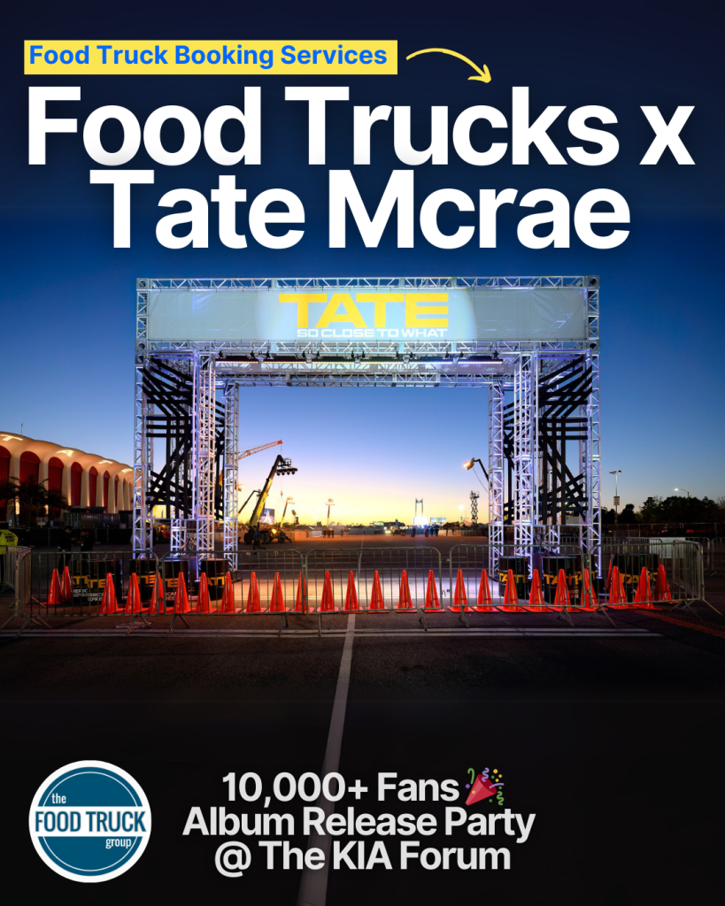 A wide shot of an AD for Tate McRae’s Album Release Party. A truss entrance arch is in the center, surrounded by orange cones. The sunset is behind the arch. On top of the AD, white text says, “Food Trucks X Tate Mcrae.” A yellow arrow points to the ‘Trucks’ word, with additional text, “Food Truck Booking Services” written above.